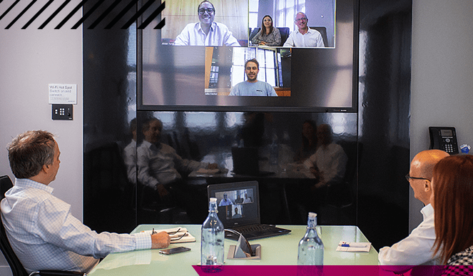 Hybrid meeting between 3 in-person attendees and 4 virtual attendees, in a meeting room at Broadway House.