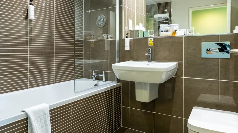 Bathroom with bath, sink and toilet 