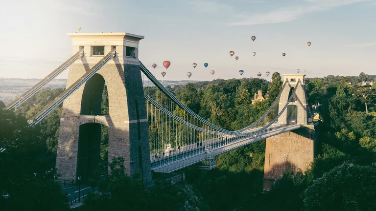 Clifton Suspension Bridge with hot air balloons in background
