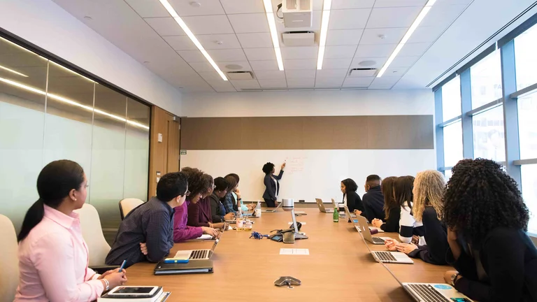employees around a boardroom table